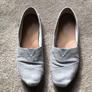 Grey Toms with gold triangles